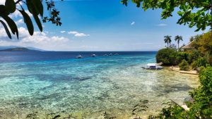 Private beach with emerald, clear waters at Sambag Hideaway